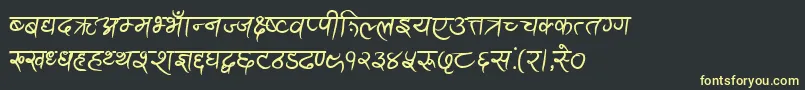 フォントAnandaAkchyarBold – 黒い背景に黄色の文字