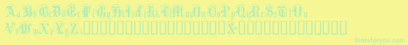 AngloText Font – Green Fonts on Yellow Background