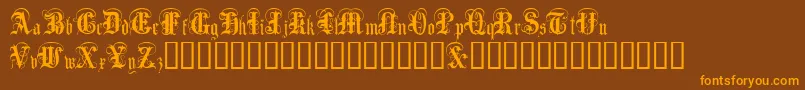 AngloText Font – Orange Fonts on Brown Background