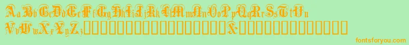 AngloText-Schriftart – Orangefarbene Schriften auf grünem Hintergrund
