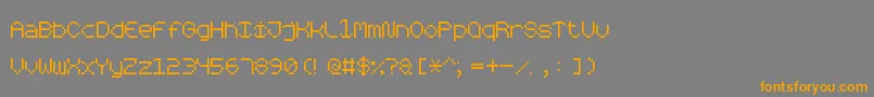 フォントRoundedPixel7 – オレンジの文字は灰色の背景にあります。