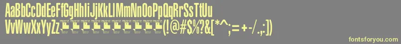 YacarenaUltraPersonalUse-fontti – keltaiset fontit harmaalla taustalla