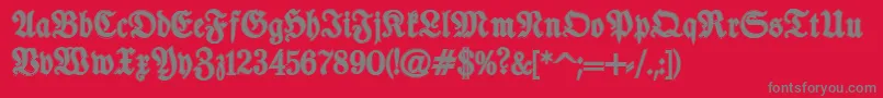 TypographerfrakturContour-Schriftart – Graue Schriften auf rotem Hintergrund
