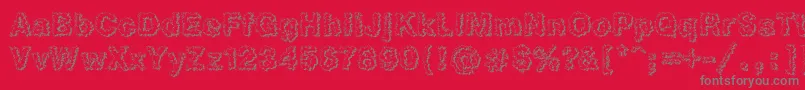 フォントHeb3Db – 赤い背景に灰色の文字