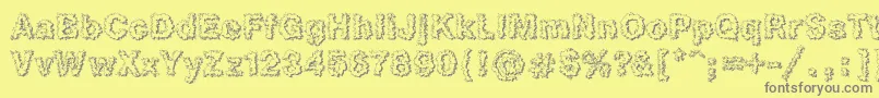 フォントHeb3Db – 黄色の背景に灰色の文字