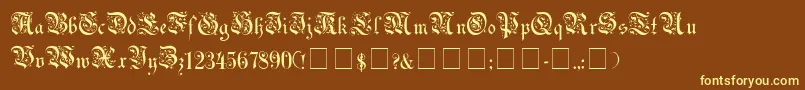 UechiGothicMedium-fontti – keltaiset fontit ruskealla taustalla