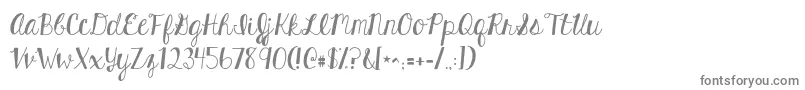 Kghardcandysolid-fontti – harmaat kirjasimet valkoisella taustalla