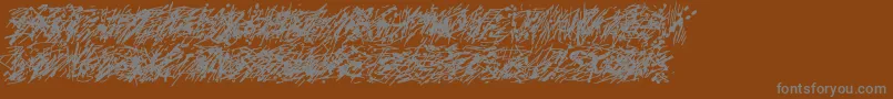 Pollock5c-Schriftart – Graue Schriften auf braunem Hintergrund