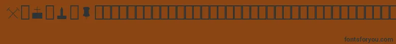Czcionka MapinfoSymbols – czarne czcionki na brązowym tle