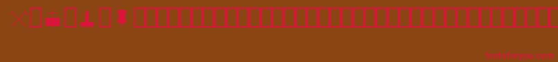 フォントMapinfoSymbols – 赤い文字が茶色の背景にあります。