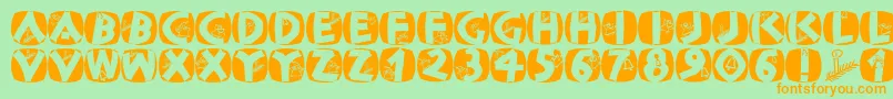 Classicapsxmas2002 Font – Orange Fonts on Green Background