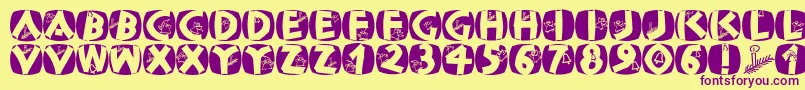 Classicapsxmas2002 Font – Purple Fonts on Yellow Background