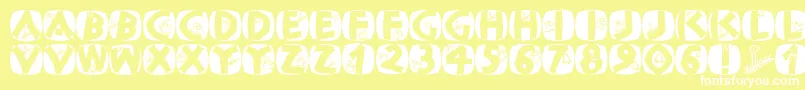 Classicapsxmas2002 Font – White Fonts on Yellow Background