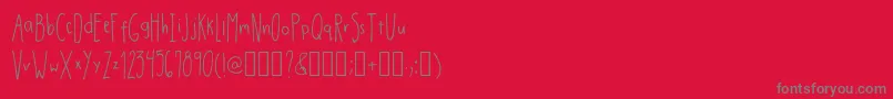 フォントDrmhandwrittenthinRegular – 赤い背景に灰色の文字