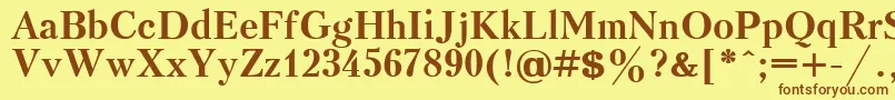 フォントKudrashovBold – 茶色の文字が黄色の背景にあります。