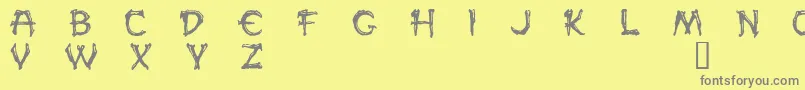 Paled-Schriftart – Graue Schriften auf gelbem Hintergrund