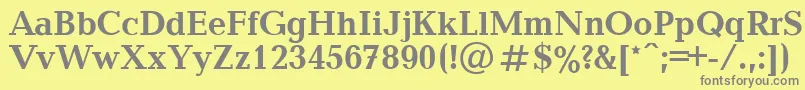 フォントBalticaBold.001.001 – 黄色の背景に灰色の文字