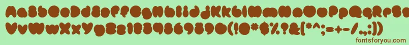 フォントMisterLoopyFill – 緑の背景に茶色のフォント