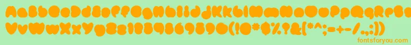 MisterLoopyFill Font – Orange Fonts on Green Background