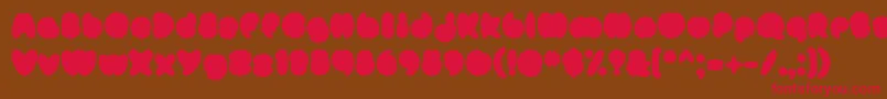 MisterLoopyFill Font – Red Fonts on Brown Background