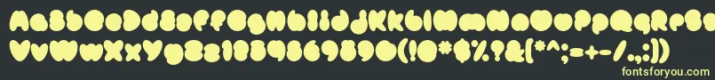 フォントMisterLoopyFill – 黒い背景に黄色の文字