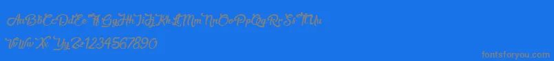 SweetheartBirthday-Schriftart – Graue Schriften auf blauem Hintergrund