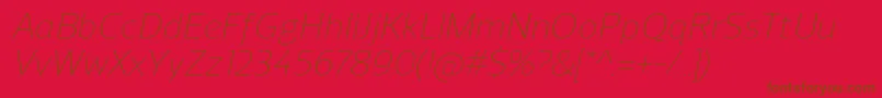 Fonte ReganLightitalic – fontes marrons em um fundo vermelho