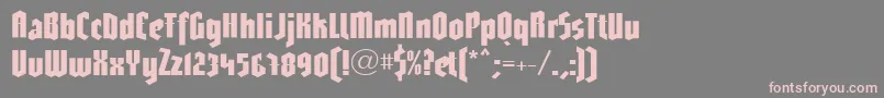 フォントLinotypeGotharda – 灰色の背景にピンクのフォント