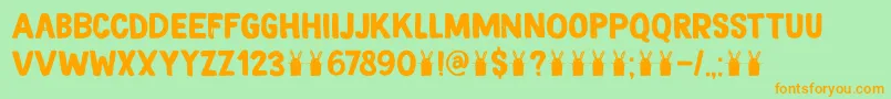 DkMagicalBrush-Schriftart – Orangefarbene Schriften auf grünem Hintergrund