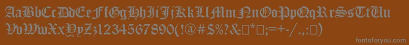 Ancientgermangothicc Font – Gray Fonts on Brown Background