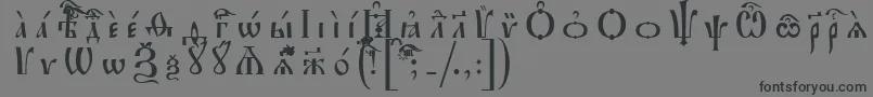 IrmologionUcsSpacedout-Schriftart – Schwarze Schriften auf grauem Hintergrund