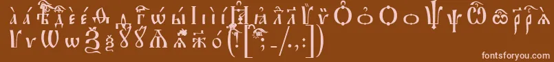 フォントIrmologionUcsSpacedout – 茶色の背景にピンクのフォント