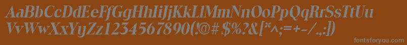 ToledoBoldItalic-fontti – harmaat kirjasimet ruskealla taustalla