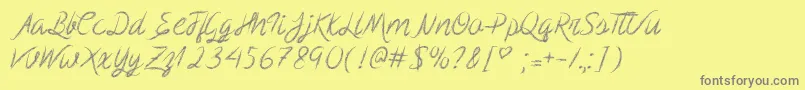 MfScribbleScript Font – Gray Fonts on Yellow Background