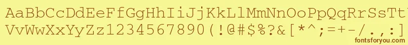 Courierdosctt-fontti – ruskeat fontit keltaisella taustalla