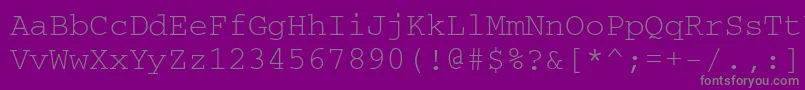 Courierdosctt-fontti – harmaat kirjasimet violetilla taustalla