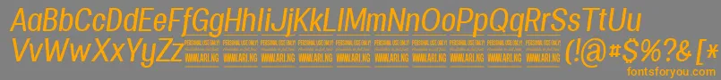 フォントSpecifypersonalConmediumitalic – オレンジの文字は灰色の背景にあります。