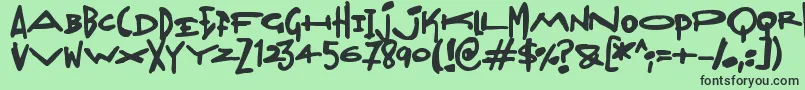 フォントMadjumbles – 緑の背景に黒い文字
