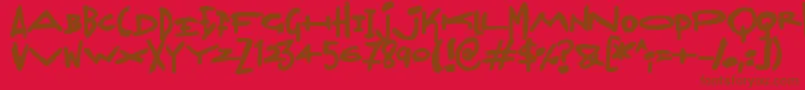 Czcionka Madjumbles – brązowe czcionki na czerwonym tle