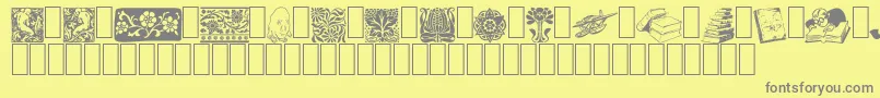 ListemagerensDingbats-fontti – harmaat kirjasimet keltaisella taustalla