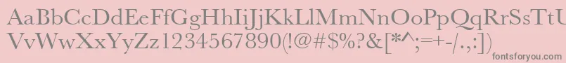 フォントUrwbaskertwid – ピンクの背景に灰色の文字