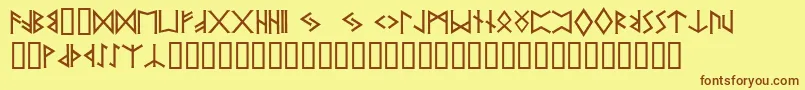 フォントPrrunes2 – 茶色の文字が黄色の背景にあります。