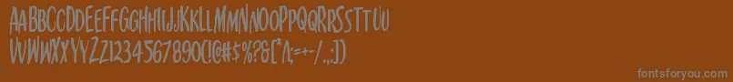 Шрифт Kennebunkportcond – серые шрифты на коричневом фоне