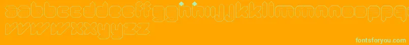 QuadLight-Schriftart – Grüne Schriften auf orangefarbenem Hintergrund