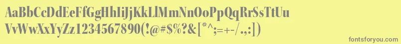 KeplerstdBlackcndisp-fontti – harmaat kirjasimet keltaisella taustalla