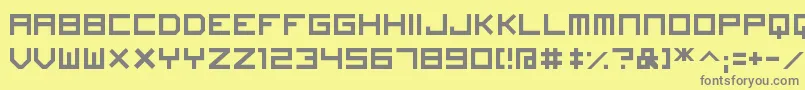 ImagineFont-fontti – harmaat kirjasimet keltaisella taustalla