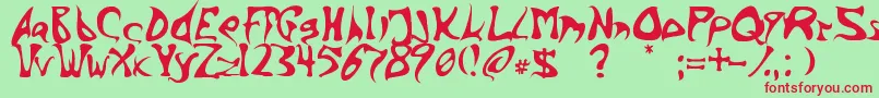 BarbedInk Font – Red Fonts on Green Background