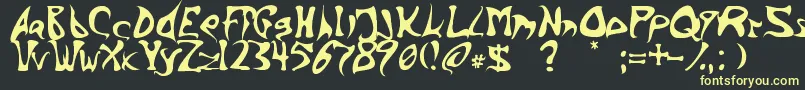 BarbedInk Font – Yellow Fonts on Black Background