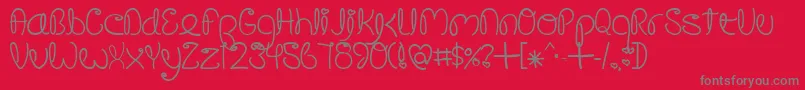 CrushedOutGirlPen Font – Gray Fonts on Red Background