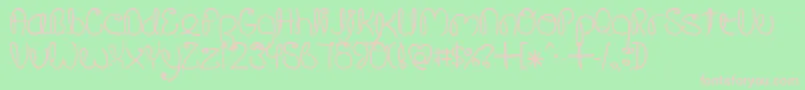 フォントCrushedOutGirlPen – 緑の背景にピンクのフォント